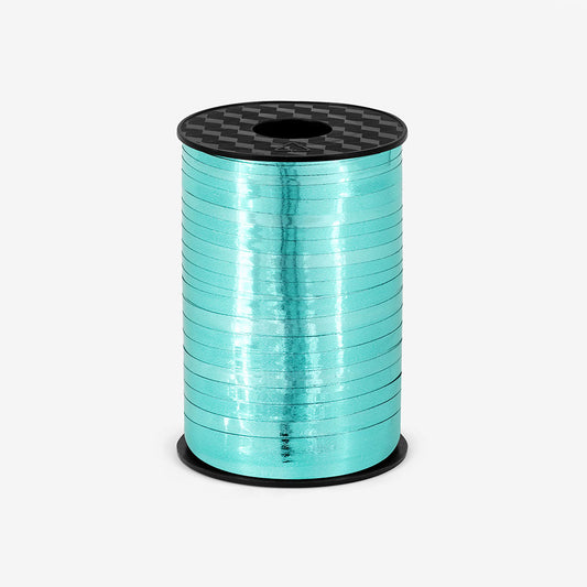 Roll of bolduc twine with turquoise blue balloons for party decoration