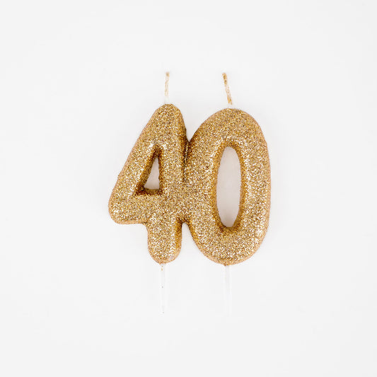 Candela per la decorazione della torta con glitter dorati per il 40° compleanno.