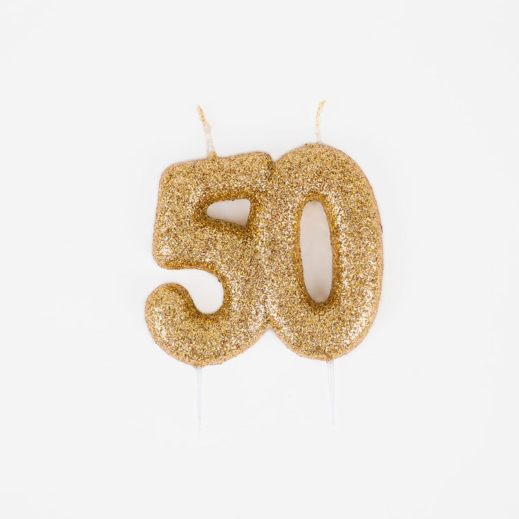 Golden glitter birthday cake candle for 50th birthday