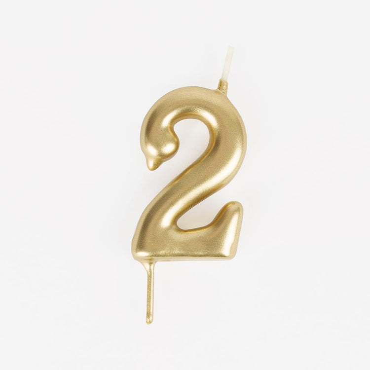 Golden number 2 birthday candle for a 2-year-old child's birthday