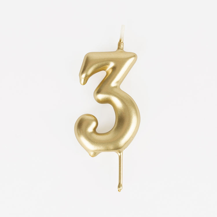 Golden number 3 birthday candle for a 3-year-old child's birthday