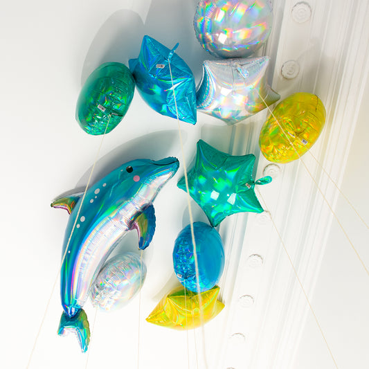 Décoration anniversaire fille sirène avec ballons hélium dauphin
