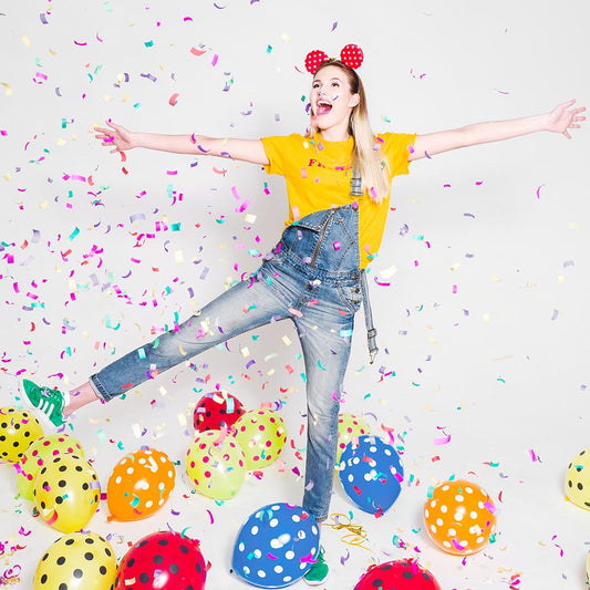 Party decoration with multicolored balloons and rectangle confetti