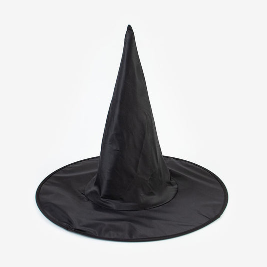 Una fiesta temática de bruja de sombrero negro disfraz de halloween niño