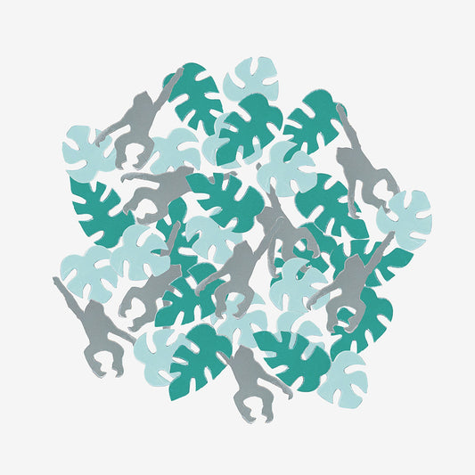 Decoración de mesa tropical: monos de confeti y hojas tropicales