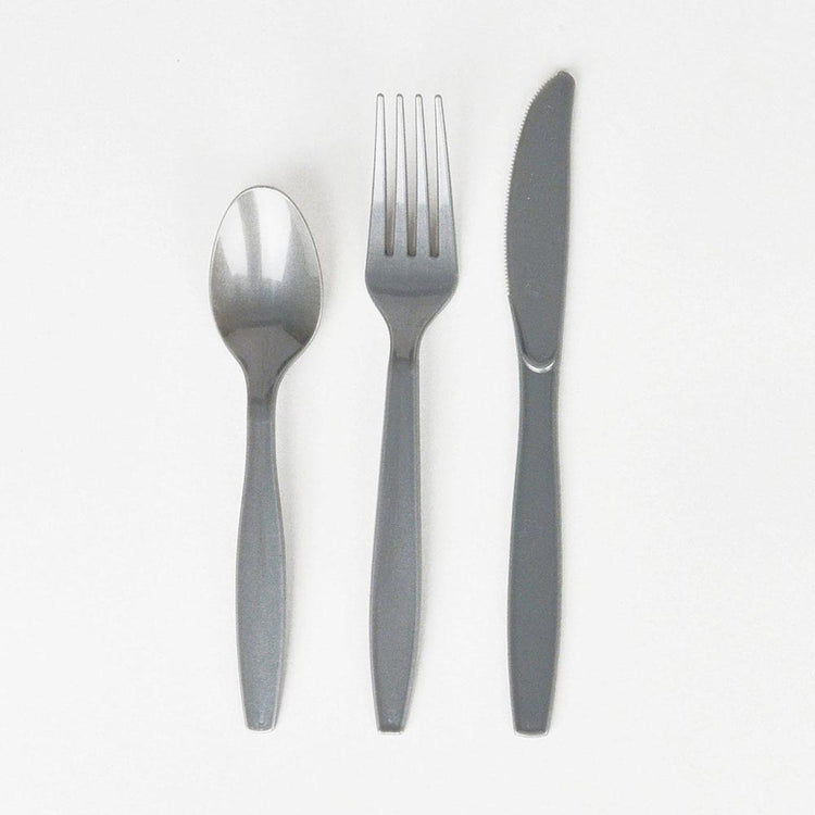 Silver plastic cutlery for child's birthday table decoration.