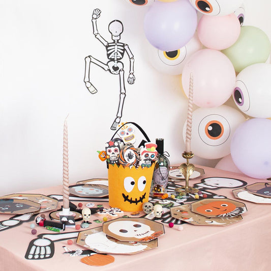 Pastel halloween table with my little day candy bucket
