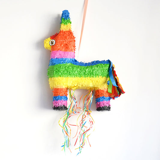 A traditional pinata in the shape of a multicolored donkey to fill with treats and gifts for a wild birthday or for a carnival snack! To free the gifts, you have to kick the donkey!