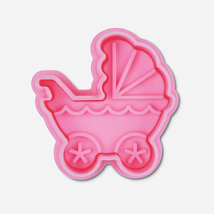 Cookie cutter with pusher in the shape of a pram for a birth party