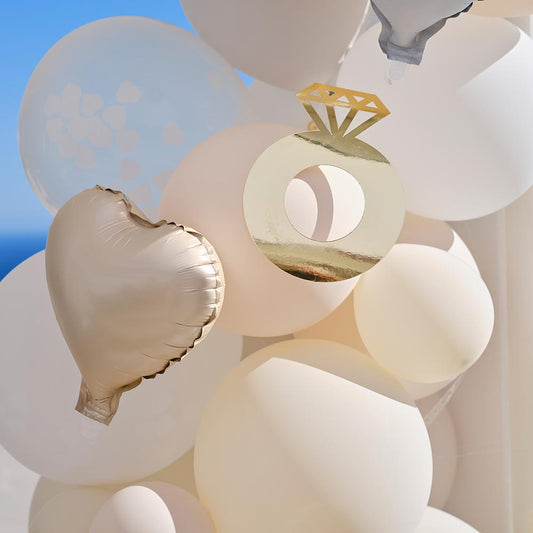Nude balloon arch with Ginger Ray details for an elegant EVJF deco