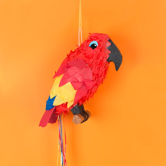 Decorazione di compleanno dei pirati o tema tropicale: pinata pappagallo.