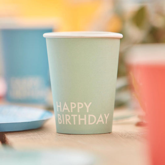 Decorazione di compleanno: tazze multicolori a raggi di zenzero