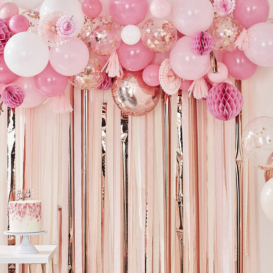 Pink birthday balloon arch