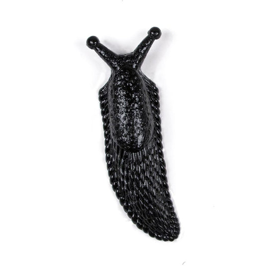 1 black slimy slug to offer as a small gift to Halloween party guests