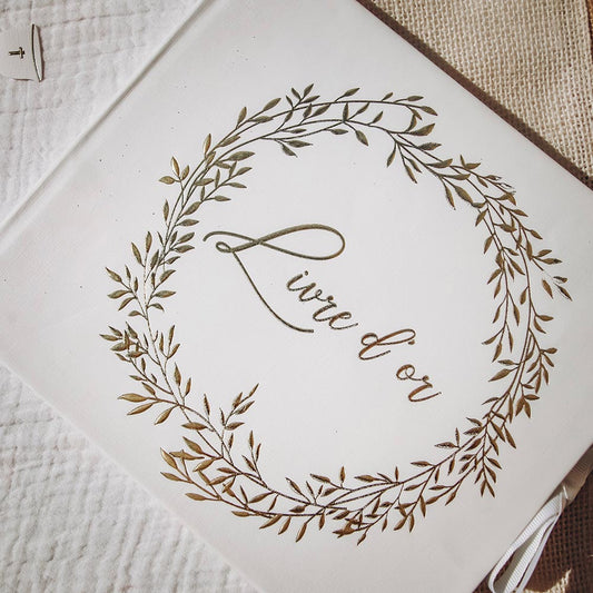 Libro de firmas perfecto en blanco y dorado para tu boda elegante y moderna.