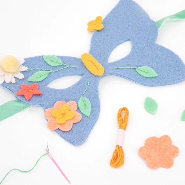 Butterfly mask to embroider: fun activity to develop motor skills