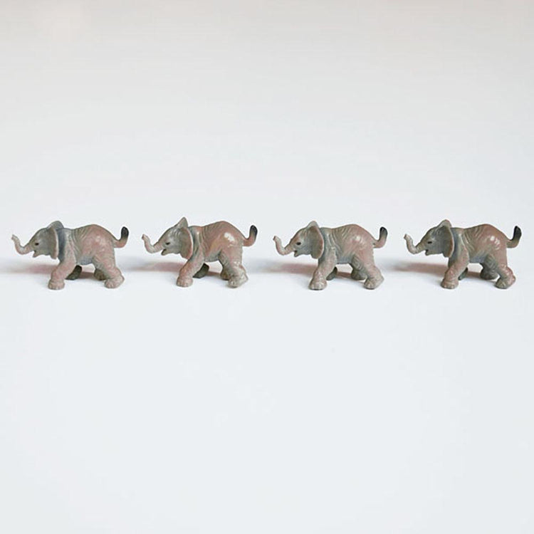 Elephant figurines for circus-themed birthday table decoration