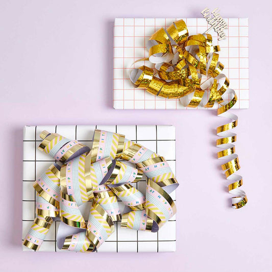 Golden happy birthday streamers for child and adult birthday