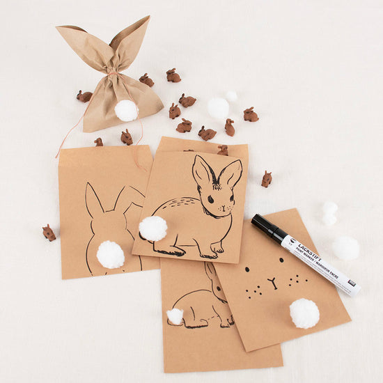 Easter rabbit surprise bags with white wool pompoms