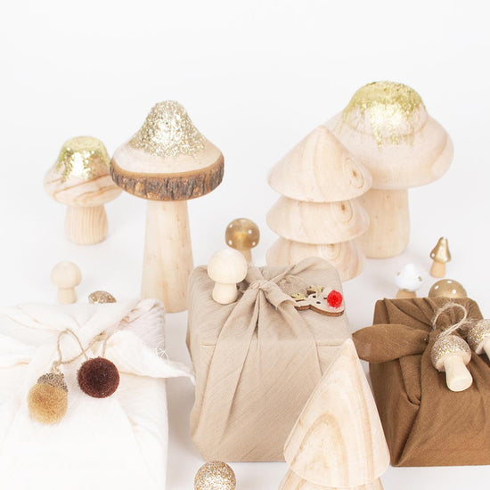Furoshiki Christmas gifts and golden wooden mushroom Christmas decorations