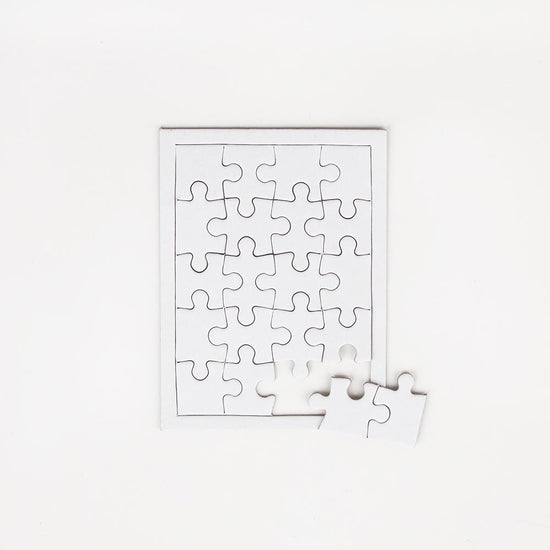Puzzle blanc Marc Vidal : cadeau invité anniversaire ou activité anniversaire