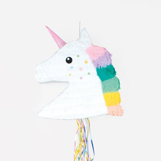 Pinata di unicorno da riempire per una festa di compleanno di una ragazza di successo