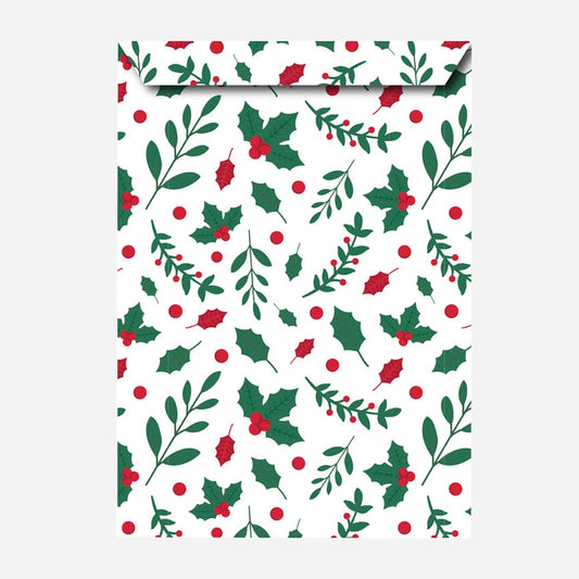 Idea para envolver regalos de Navidad: bolsa de regalo de papel de acebo
