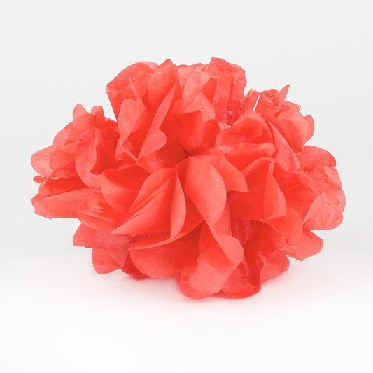 A red satin pompom for a colorful child's birthday decoration