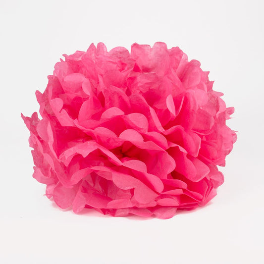 A fuchsia pink satin pompom for a girl's birthday decoration