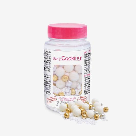 Jar of white and gold sugar pearls for cake decoration