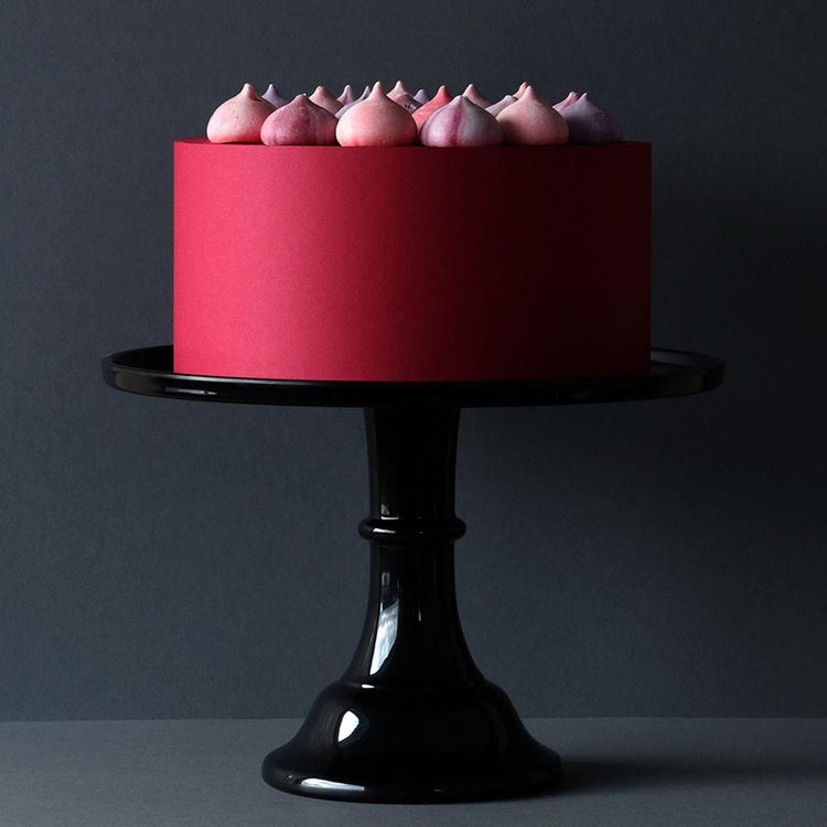 Chic birthday cake with black cake stand