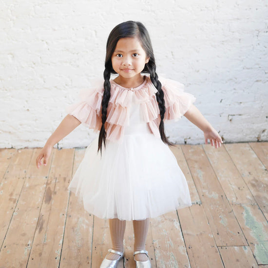 White tulle princess dress and pink tulle cape