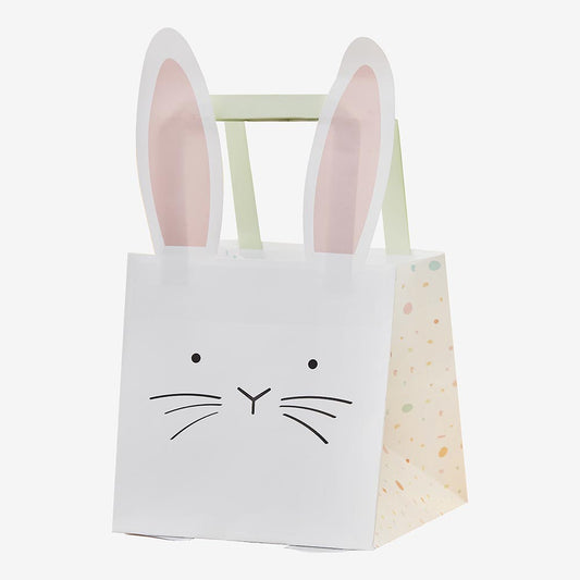 Búsqueda de huevos de Pascua: pequeñas bolsas de regalo de conejos en colores pastel