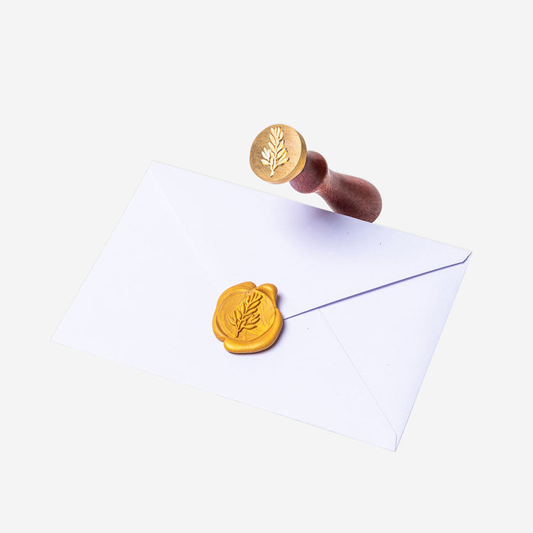 Laurel flower design stamp to seal invitation envelope with wax