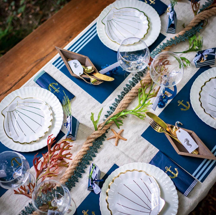Decorative idea for a child's sailor wedding table: placemats and sailor decor