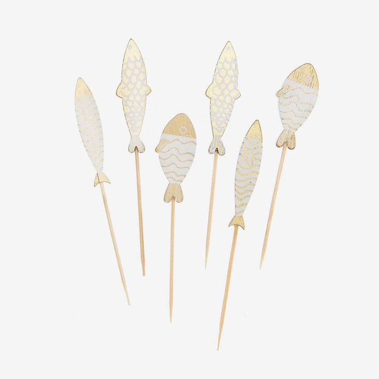 White and gold fish wooden cocktail picks: seaside wedding decor