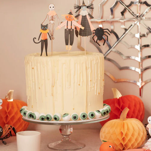 Kitchen decoration for Halloween party: skeleton and witch toppers